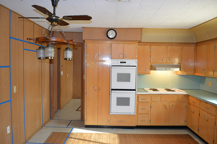 beige cabinets with an old style oven