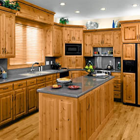 large kitchen with center island and all wood cabinets